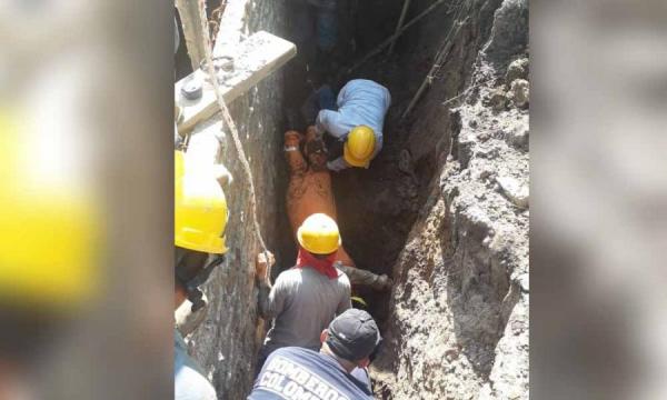 Un alud casi entierra a dos obreros en el Barrio La Cima de Ibagué 1